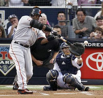 On August 4, 2007, Barry Bonds hits his 755th home run in the San Francisco Giants' loss to the San Diego Padres.  Bonds tied Hank Aaron's career mark.