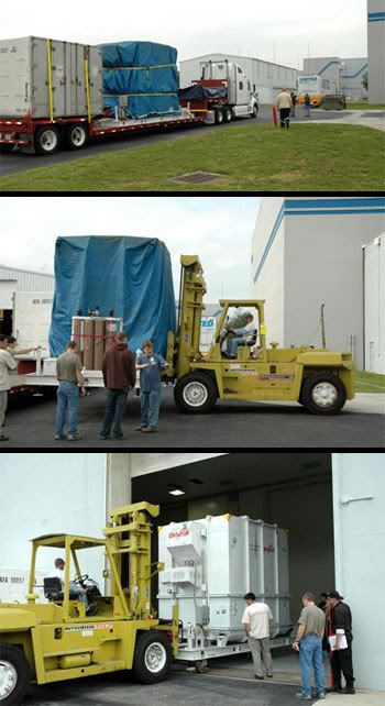 The flatbed truck carrying the Dawn spacecraft arrives at the Astrotech facility at Kennedy Space Center in Florida.