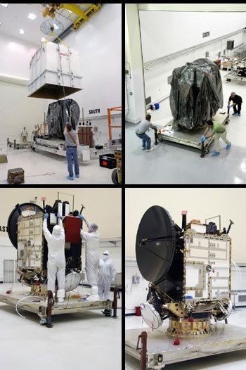 Technicians remove Dawn from its crate and protective cover to begin final launch preparations.