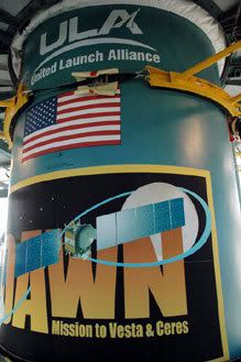 The Dawn misson logo on the Delta II rocket...which stands ready for lift-off at Pad 17-B in the Cape Canaveral Air Force Station in Florida.