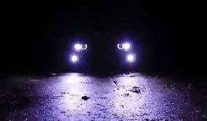 Headlights at night.