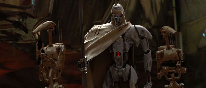The Magnadroid surrounded by two battledroids in REVENGE OF THE SITH.