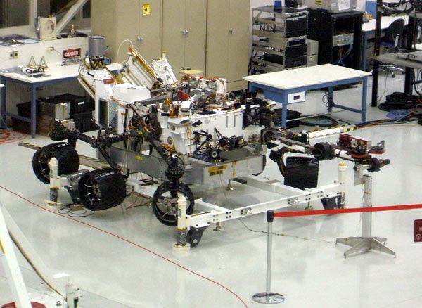 The CURIOSITY Mars rover on display inside the Spacecraft Assembly Facility.
