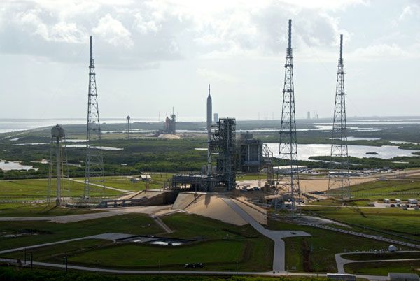 The present and the future (hopefully)...both poised for launch at Kennedy Space Center in Florida.