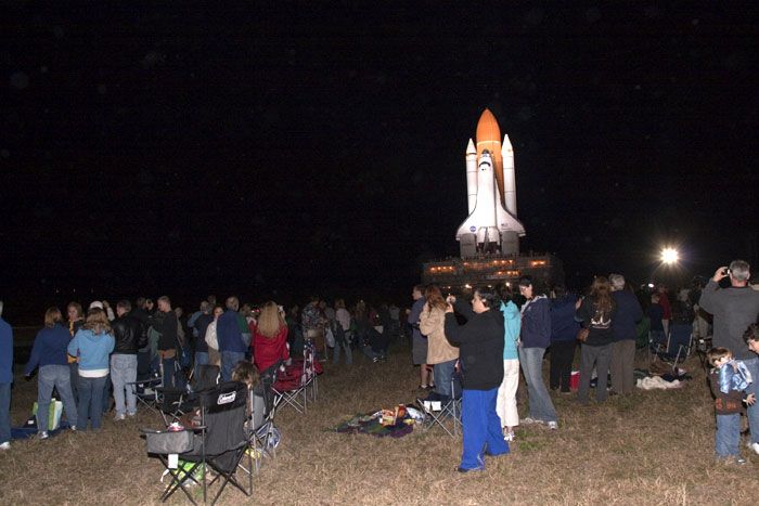 900 NASA employees and their families and friends watch as space shuttle Discovery heads back to LC-39A at the Kennedy Space Center in Florida, on January 31, 2011.