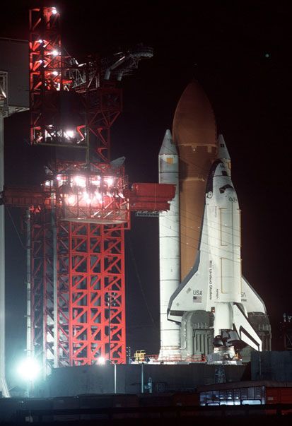 A nighttime shot of space shuttle Enterprise sitting atop its SLC-6 launch pad at Vandenberg AFB in California.