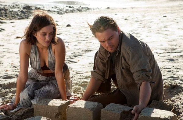 Cobb shares a moment with his late wife Mal (Marion Cotillard) within a dream world in INCEPTION.