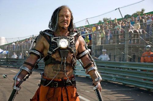 Mickey Rourke sets aside his wrestler outfit to play Whiplash in IRON MAN 2.