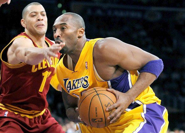Kobe Bryant drives past the Cleveland Cavaliers' Anthony Parker during the Lakers game on January 13, 2012. L.A. won this game, 97-92.