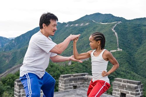 Mr. Han (Jackie Chan) teaches Dre Parker (Jaden Smith) kung-fu atop the Great Wall of China in THE KARATE KID.