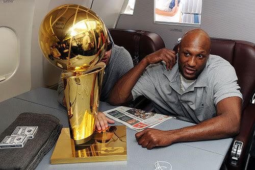 Lamar Odom with the new shiny hardware that he helped the Lakers win almost two months ago.