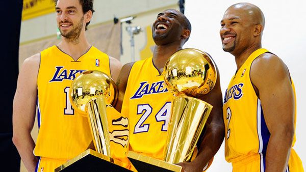 Pau Gasol, Kobe Bryant and Derek Fisher pose for a group photo at the Los Angeles Lakers' Media Day event in El Segundo California...on September 25, 2010.
