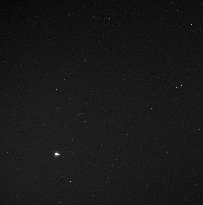 An image of Earth and the Moon that was taken by NASA's MESSENGER spacecraft, from near the orbit of Venus (114 million miles away), on May 6, 2010.