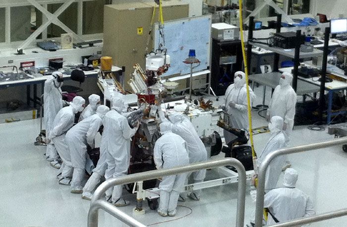 JPL engineers are about to install the Remote Sensing Mast onto the CURIOSITY Mars Rover.