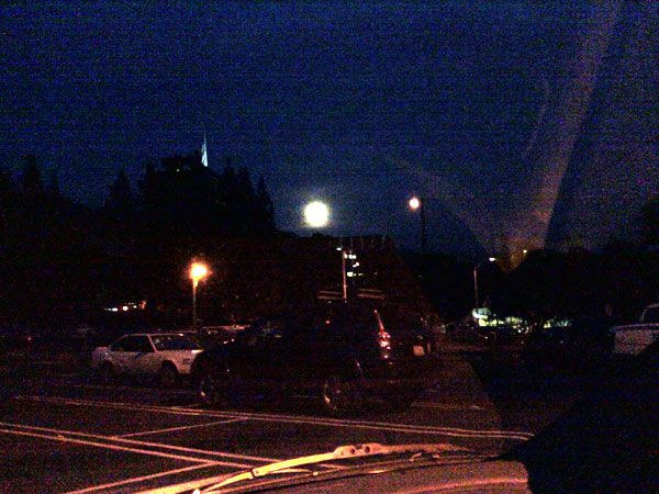 A full moon shines above NASA's Jet Propulsion Laboratory.