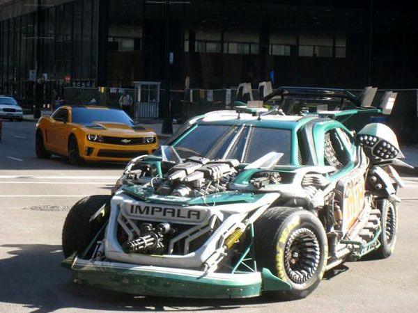 A 'NASCAR-con', with Bumblebee's Camaro behind it.