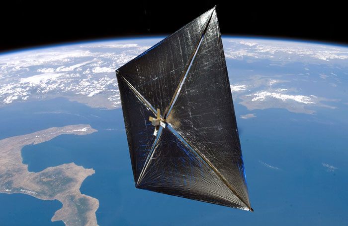 A composite photo of the NanoSail-D spacecraft in low Earth orbit.