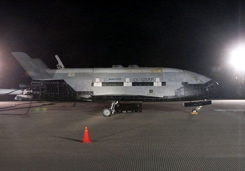 The X-37B Orbital Test Vehicle (OTV) on a runway at Vandenberg Air Force Base, California...after returning home from space on December 3, 2010.