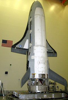 The X-37B Orbital Test Vehicle (OTV) is prepped for launch at a Boeing Phantom Works facility in California.