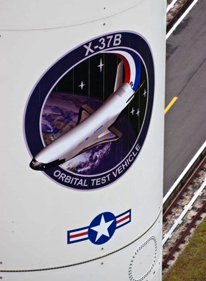 A close-up of the X-37B's mission logo on the side of the Atlas V rocket's payload fairing.