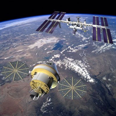 An artist's concept of the Orion spacecraft approaching the International Space Station.