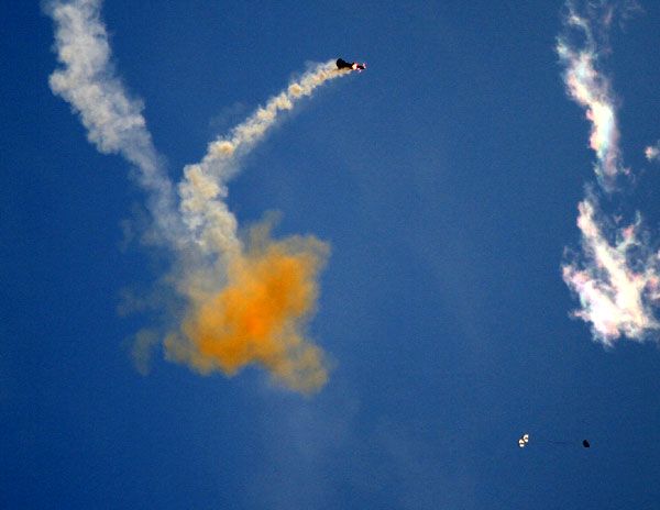 The mock-up Orion spacecraft (lower right) separates from the launch abort system during the PA-1 test.