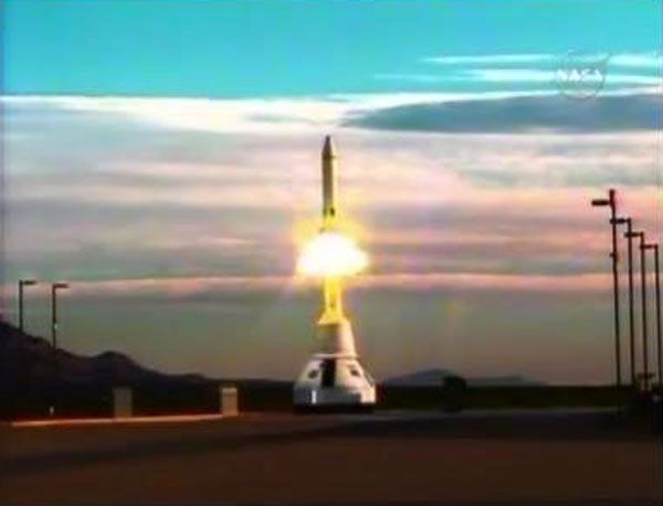 The mock-up Orion spacecraft and the launch abort system are about to take off on the PA-1 test (NASA TV).