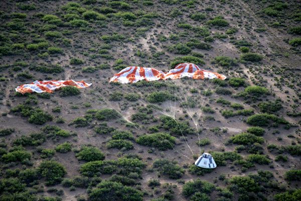 The mock-up Orion spacecraft successfully lands in the New Mexco desert after concluding the PA-1 test.