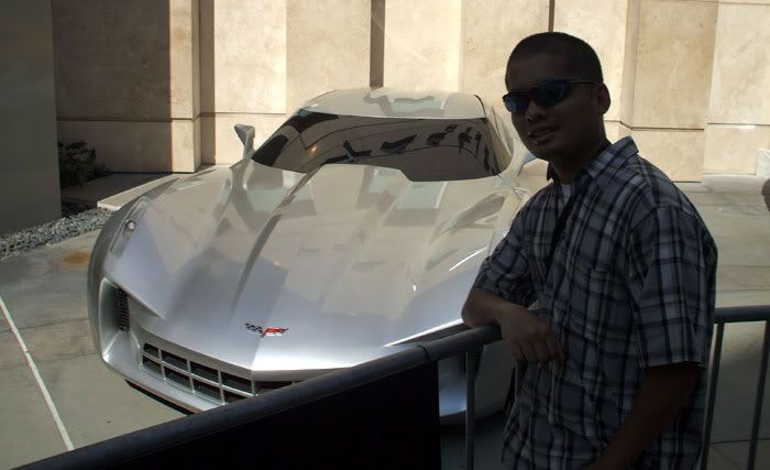 Posing in front of the Corvette Stingray that represents the Autobot known as Sideswipe in TRANSFORMERS 2.