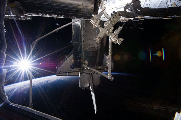 Space shuttle Discovery is docked to the International Space Station during flight STS-131, on April 7, 2010.