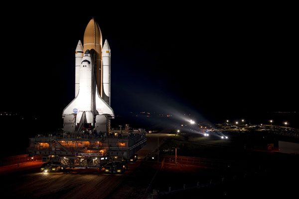 Space shuttle Atlantis rolls out of the Vehicle Assembly Building at Kennedy Space Center in Florida on May 31, 2011.