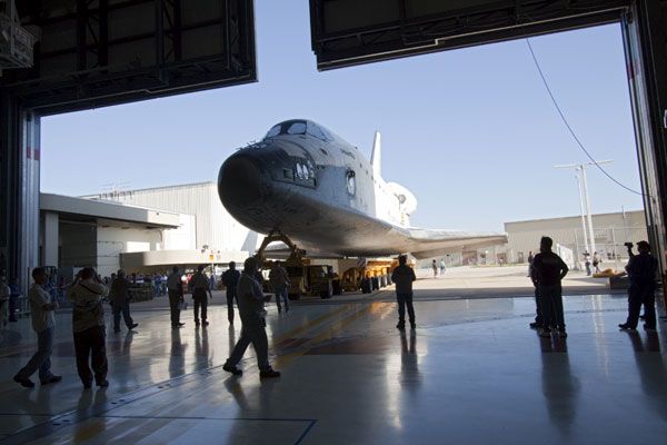 In preparation for being transported to the VAB to undergo STS-135 launch preparations, Atlantis emerges from her OPF at Kennedy Space Center in Florida, on May 17, 2011.