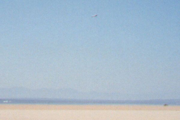 Space shuttle Endeavour prepares to land at Edwards Air Force Base in California after completing her maiden flight, STS-49, on May 16, 1992.