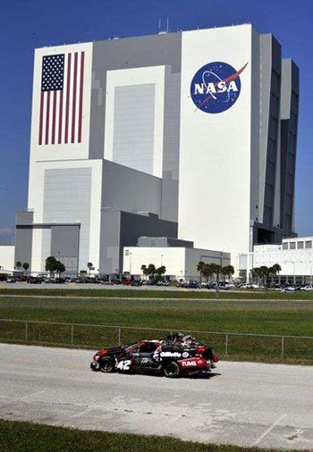 An Autobot 'Wrecker' drives past the Vehicle Assembly Building at NASA's Kennedy Space Center in Florida.
