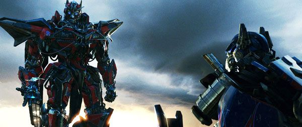 Sentinel Prime confers with fellow Autobot leader Optimus Prime about the Great Matrix of Leadership in TRANSFORMERS: DARK OF THE MOON.