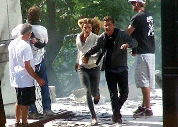 While holding hands with Megan Fo—err, Rosie Huntington-Whiteley, Shia LaBeouf runs away from danger in TRANSFORMERS 3.