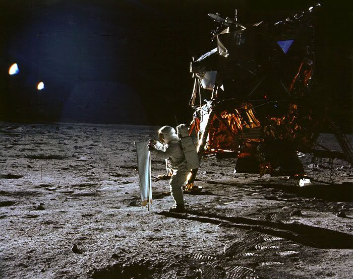Astronaut Buzz Aldrin sets up a lunar experiment after he and Neil Armstrong became the first humans to set foot on the Moon, on July 20, 1969.