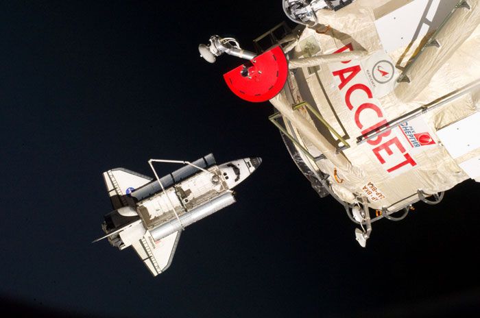 With the Russian-built RASSVET Mini-Research Module in the foreground, space shuttle ATLANTIS floats near the ISS before finally departing the outpost on May 23, 2010.