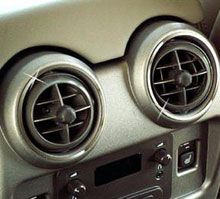 A car's air conditioning vents.
