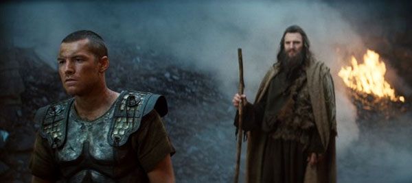 Demigod-turned-hero Perseus (Sam Worthington) confers with god-turned-father Zeus (Liam Neeson) in CLASH OF THE TITANS.