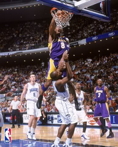 Kobe 'posterizes' Dwight Howard during a Lakers road game in 2004.