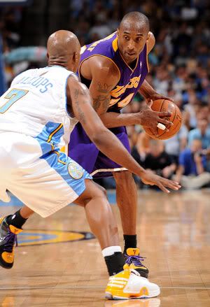 Kobe Bryant squares up against Chauncey Billups of the Denver Nuggets in Game 6 of the Western Conference Finals on May 29, 2009 in Denver, Colorado.