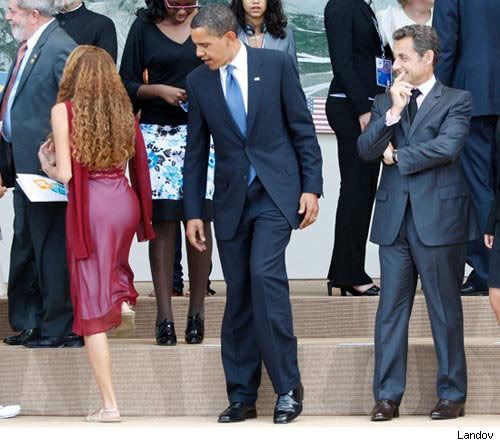 Sarkozy is amused.