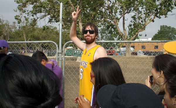 While everyone waited in line to enter the Coliseum, they were treated to an unexpected appearance by Pau Gasol's long-lost brother.  Haha.