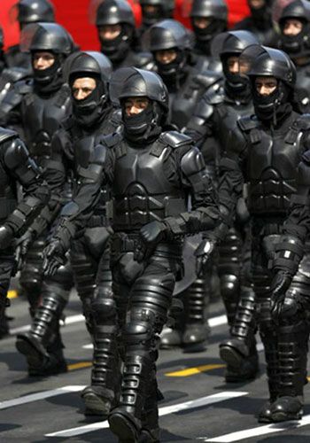 Peruvian anti-riot police officers trying to impersonate Robocop...