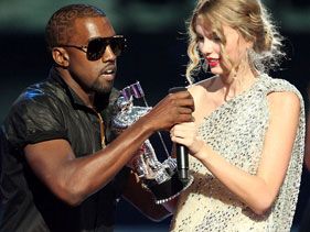 Rapper Kanye West grabs the mic from Taylor Swift after storming the stage at the 2009 MTV VMAs.