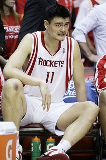Yao Ming sits on the bench during the Houston Rockets' Game 3 loss against the Lakers last Friday.