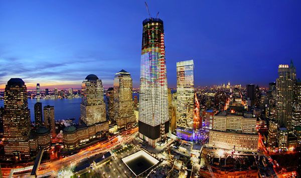 Dusk falls upon the 1 World Trade Center and the rest of Manhattan in December of 2011.