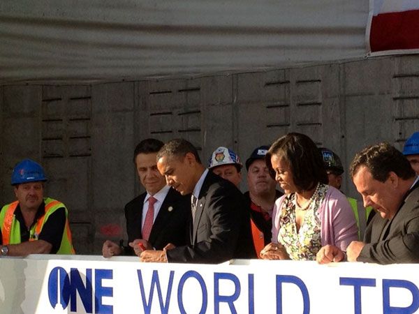 President Obama and the First Lady sign a steel beam that will be one of the final components to complete the 1 WTC, on June 15, 2012.