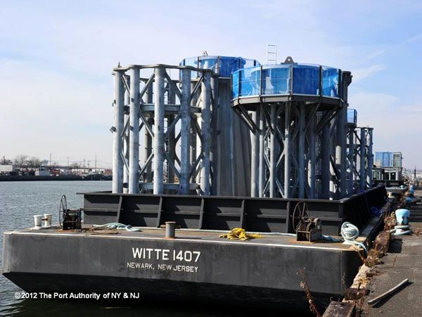 Nine sections of the antenna spire, currently located at Port Newark, await transfer to the 1 WTC's construction site in Lower Manhattan, on November 30, 2012.